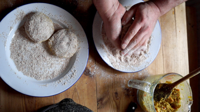 Converting portions of mix into burgers by hand