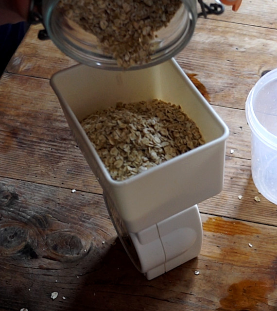 Measuring-out 100 grams oats to put into soak – to make half-a-litre of oat milk