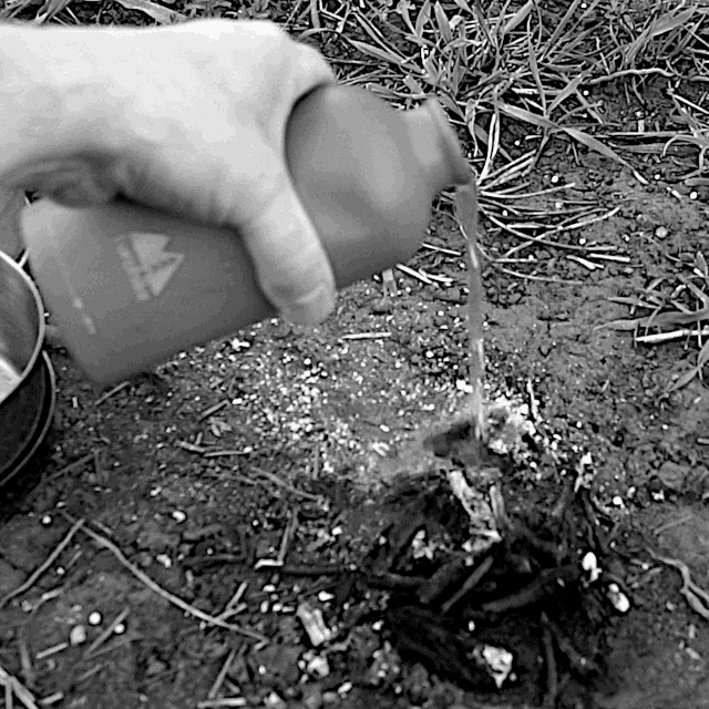 Using the Kelly Kettle: Quench the embers with water to make sure they’re completely cold and extinguished